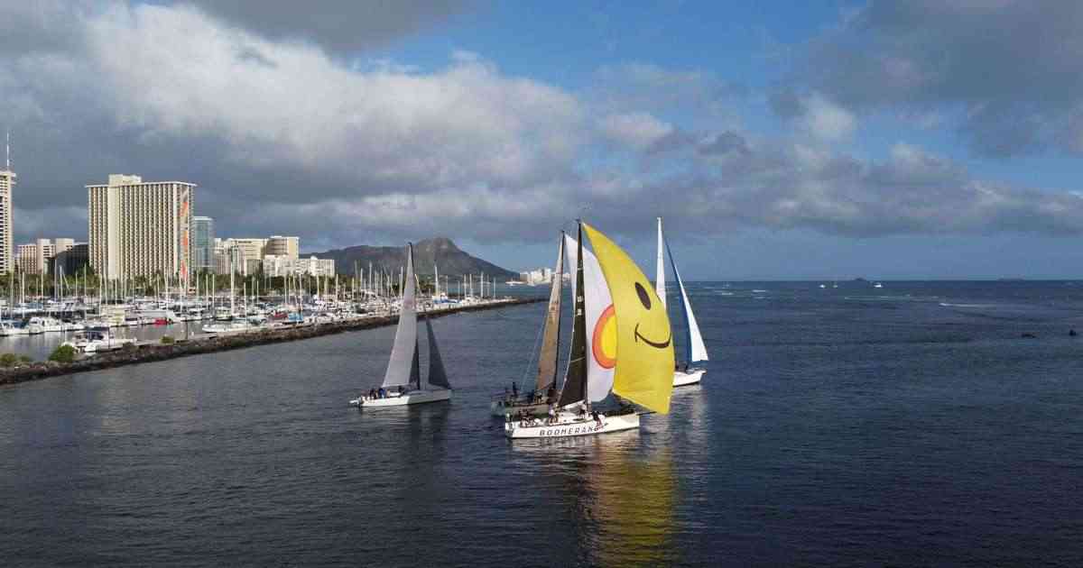 Sailboats racing off Waikiki with Diamond Head and the Ala Wai Boat Harbor behind, Honolulu, Oahu