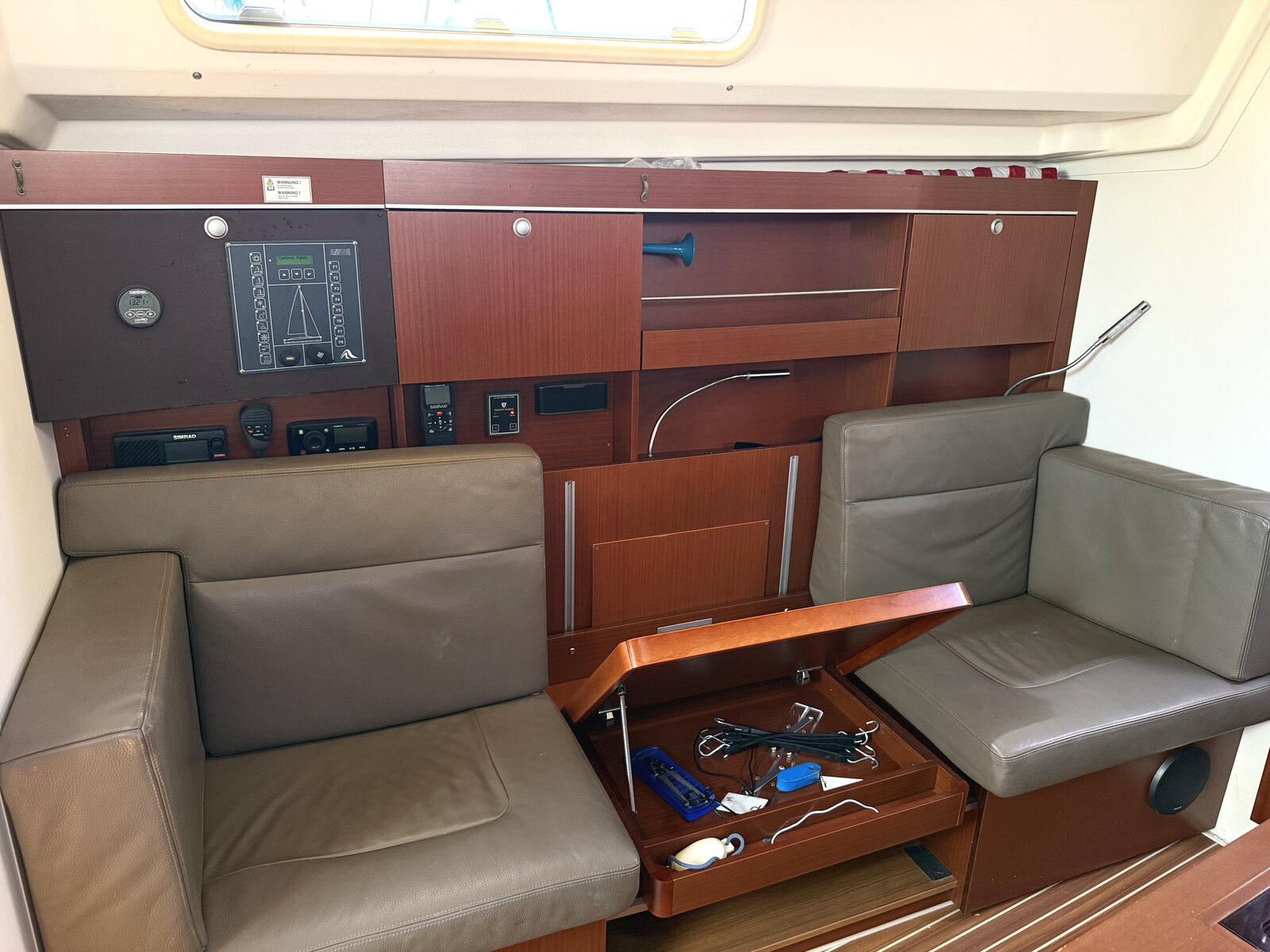 2014 Hanse 385 "Effortless" for sale, Honolulu Hawaii &mdash; Nav settee with concealed storage drawer (photo 20 of 29)