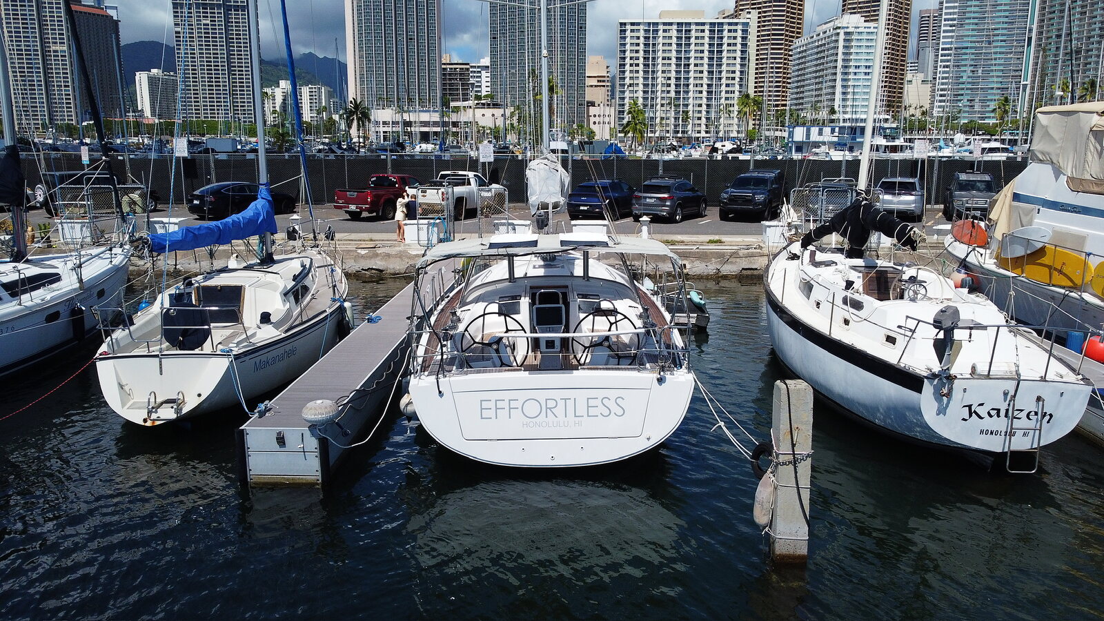 2014 Hanse 385 "Effortless" for sale, Honolulu Hawaii &mdash; Starboard bow from the air &mdash; Honolulu skyline behind (photo 3 of 29)